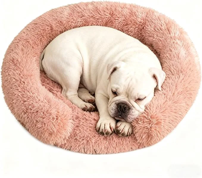 Carefully Designed Calming Dog Bed for Small Medium Dogs Anti-Anxiety Donut Washable Puppy Bed Orthopedic Cushion Soft Fluffy Faux Fur Plush Warming Cozy Cat Bed Fits up to 25 lbs Pets Round Blush 23 About ThisOverview Crafted