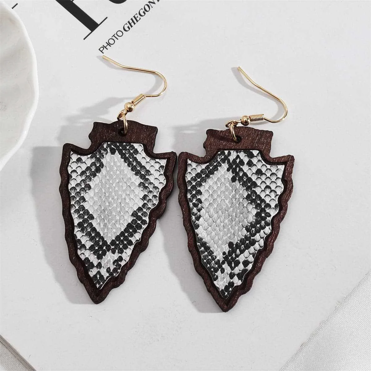 Selected White Polystyrene Wood Goldtone Snake-Embossed Drop Earrings Outstanding