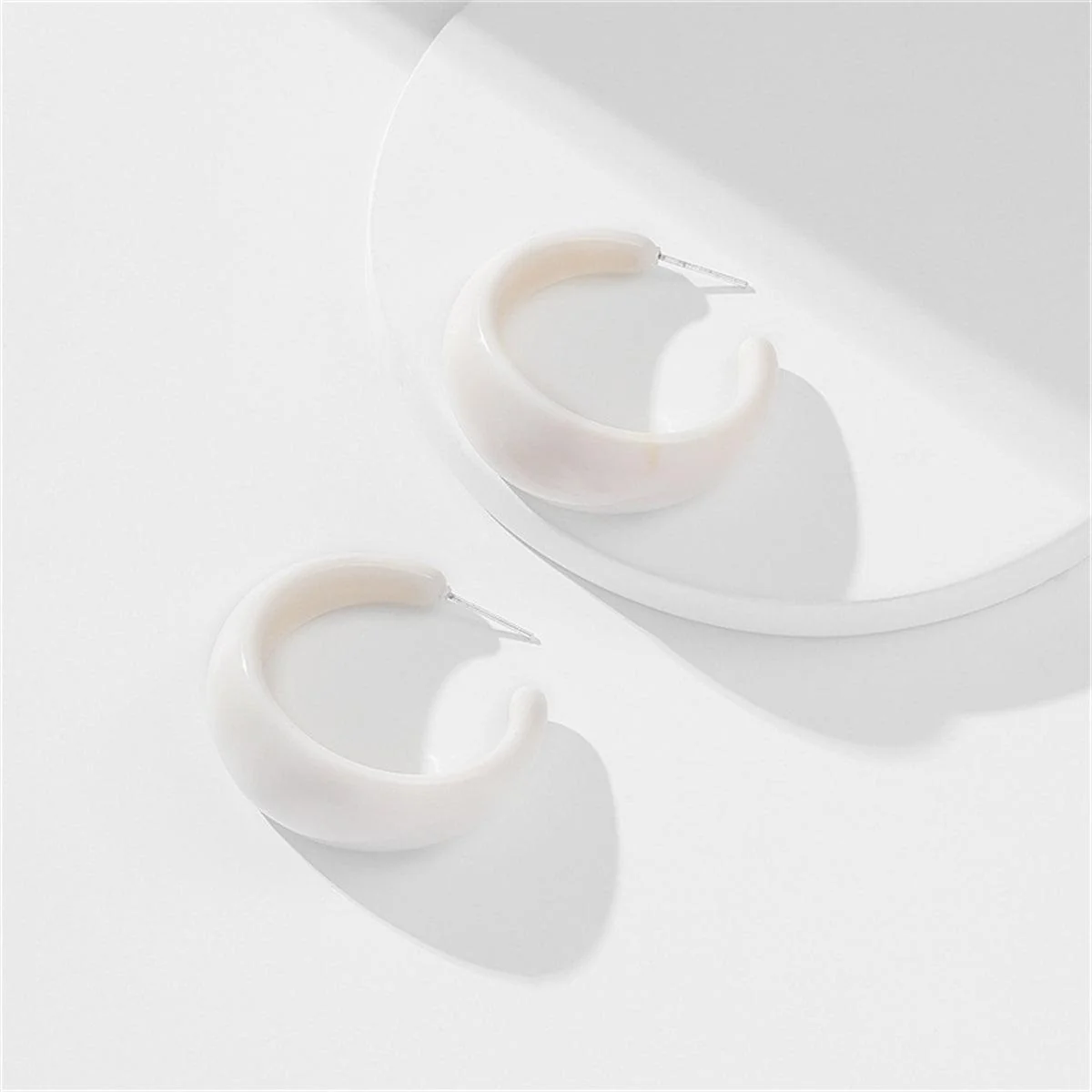 User-Friendly White Resin Silvertone Huggie Earrings Comfortable